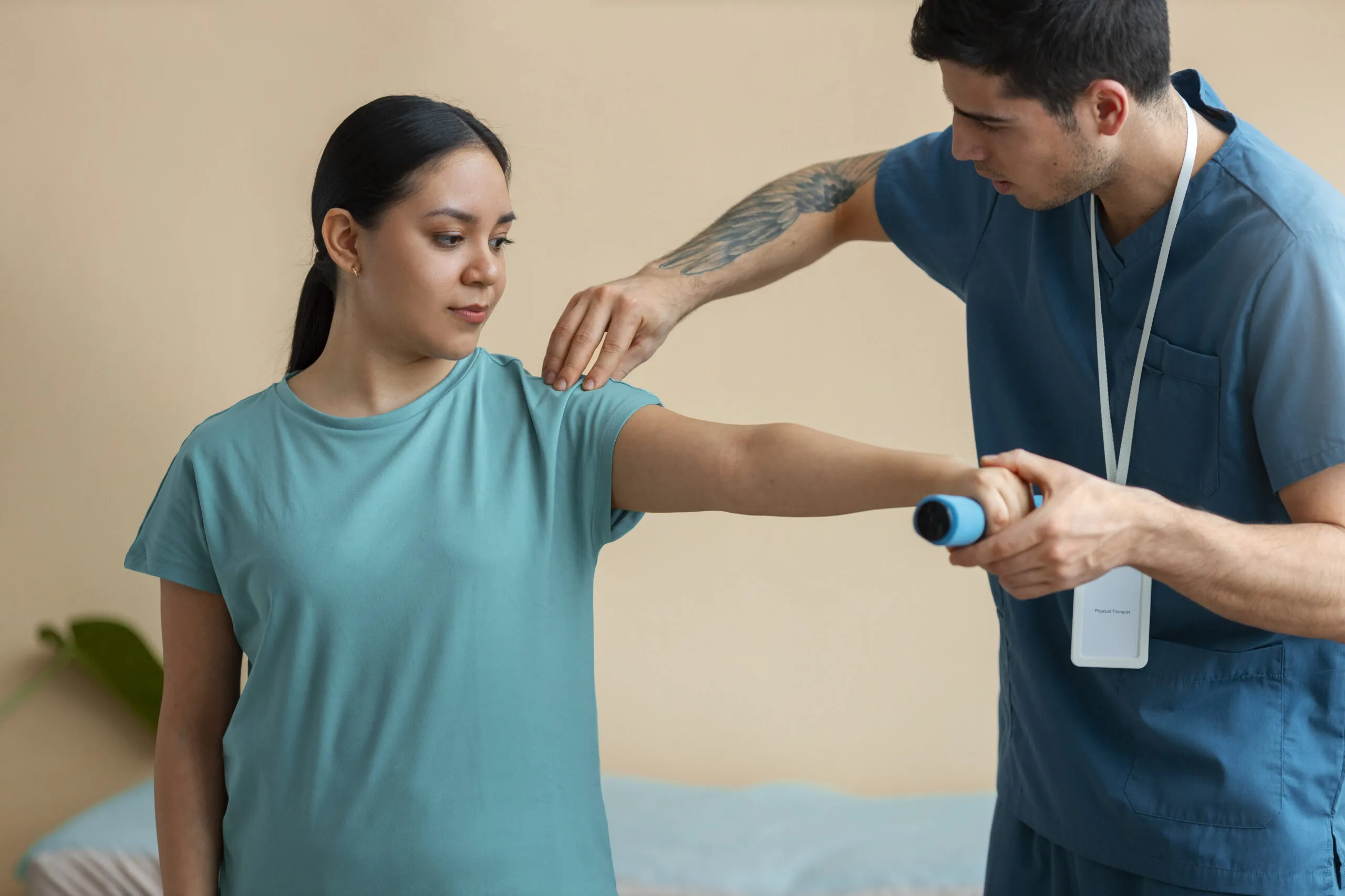 doctor helping patient in physiotherphy